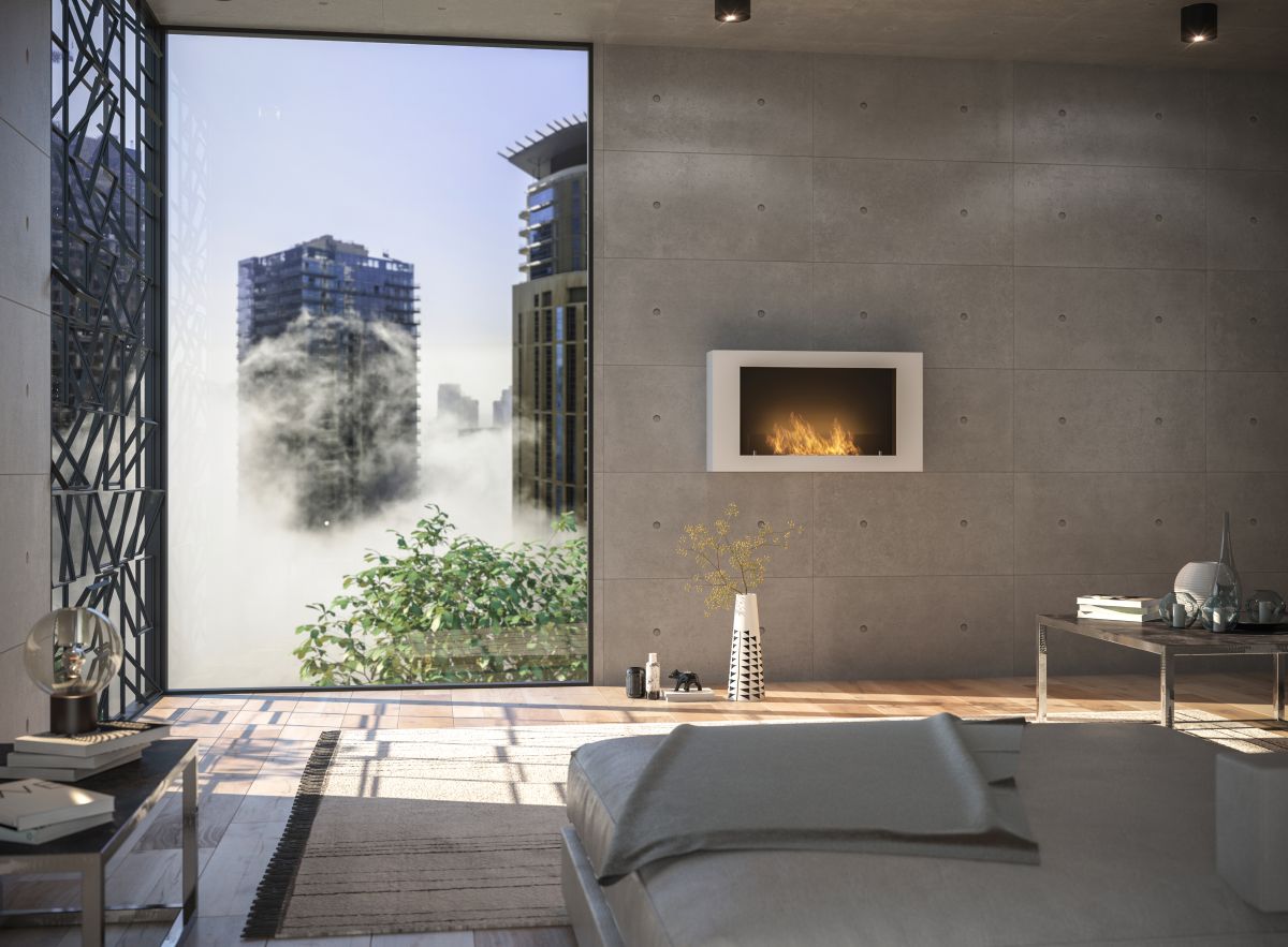 Biotakka Infire Murall 1000 valkoinen harmaalla betoniseinällä.