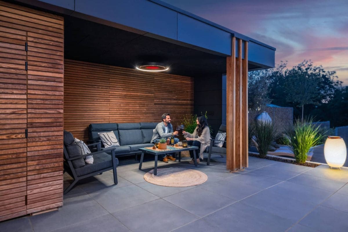 bromic eclipse patio heater at home terrace with people
