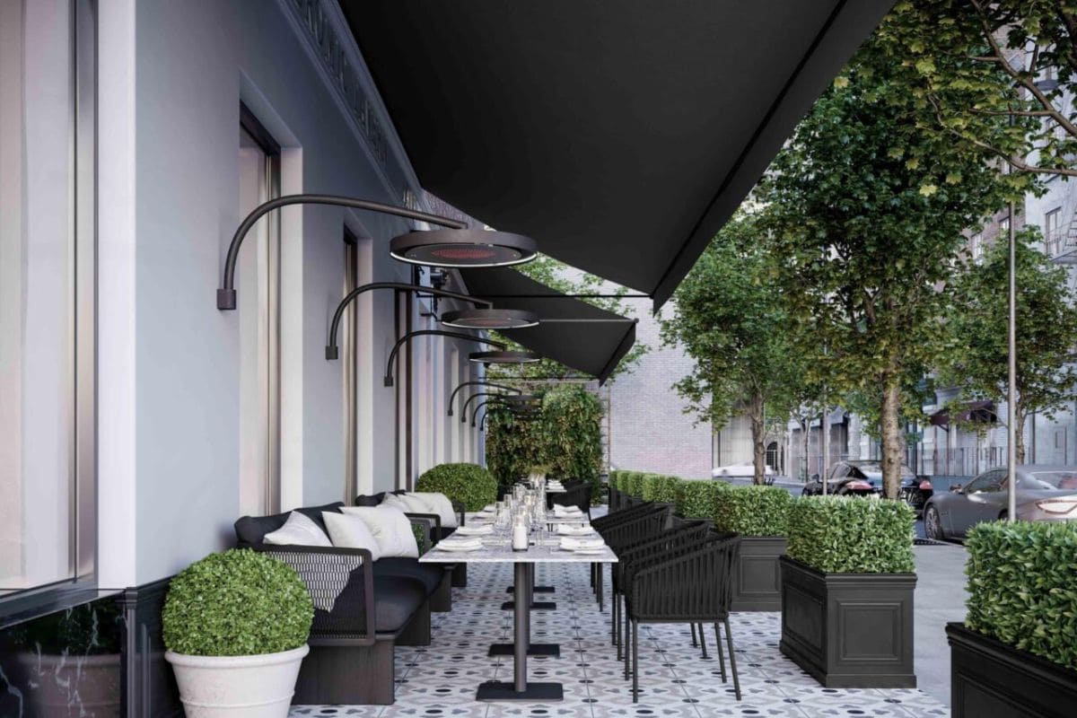 bromic eclipse wall-mounted patio heater on a restaurant terrace