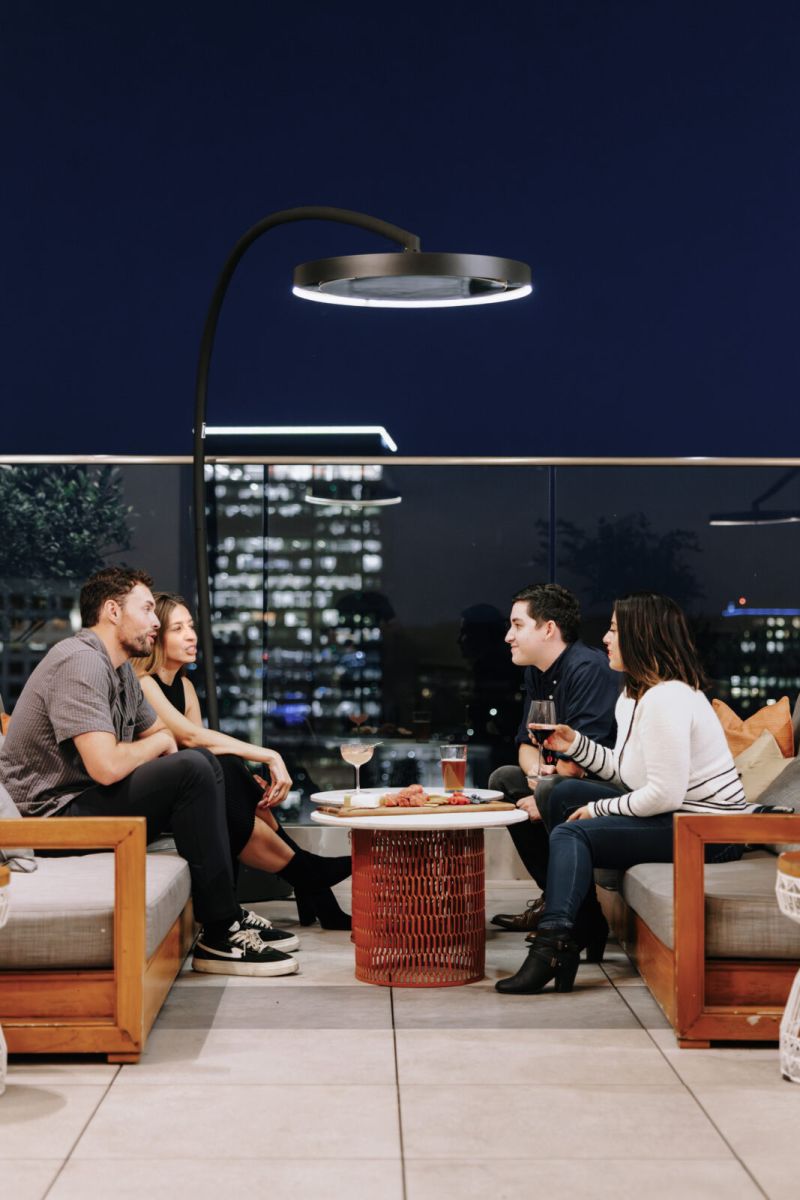 bromic eclipse portable patio heater at roof terrace with people enjoying