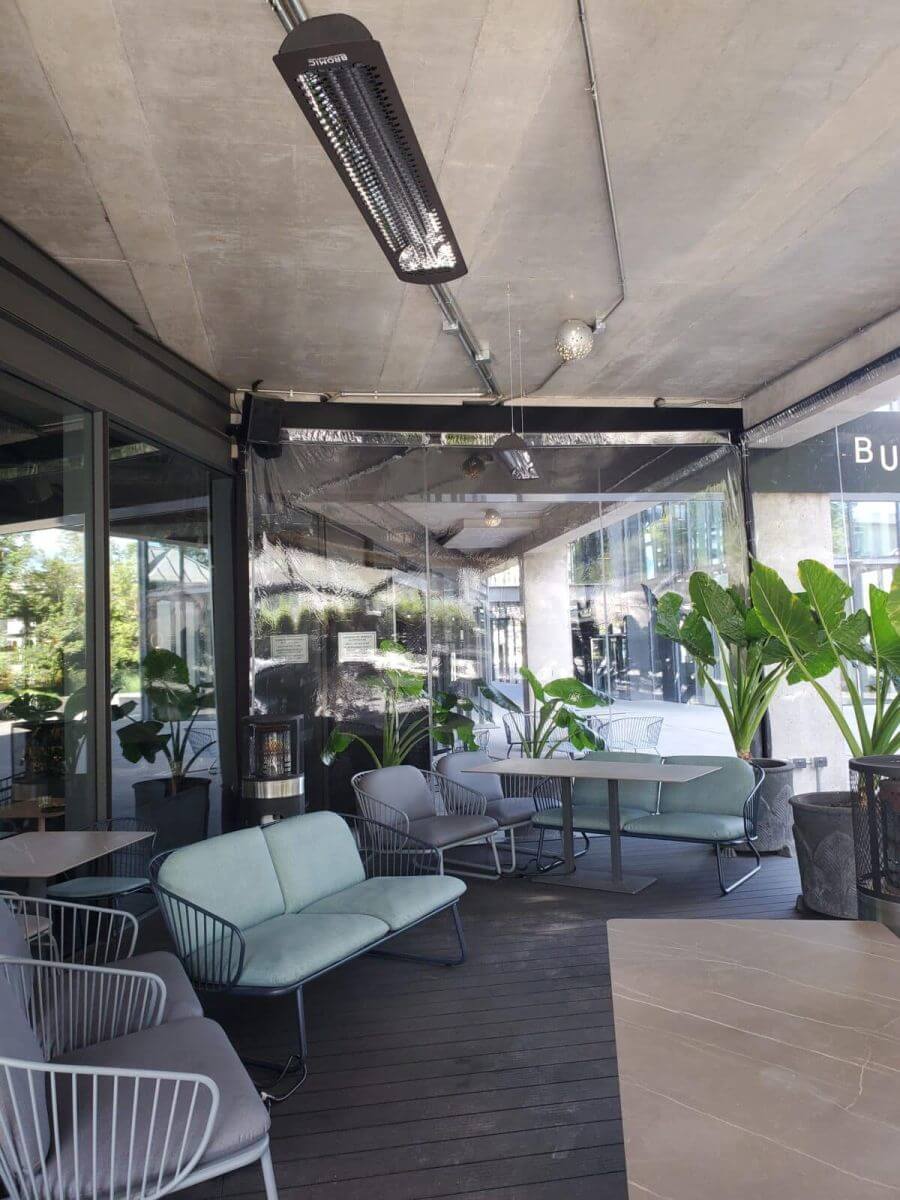 Bromic Tungsten patio heaters at covered lounge area